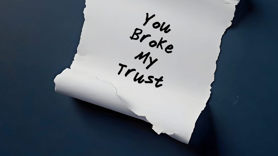 torn paper on dark blue background written you broke my trust means trust is broken when someone break expectations or promises made within relationship betrayal leading to emotional pain