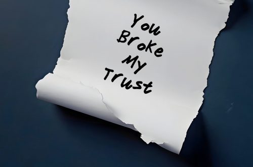torn paper on dark blue background written you broke my trust means trust is broken when someone break expectations or promises made within relationship betrayal leading to emotional pain
