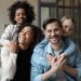 head shot portrait happy multiracial family looking at camera