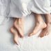 female and a man under the blanket